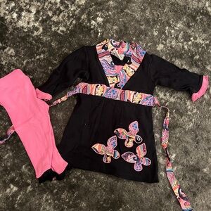 Black Dress with Pink Leggings and Butterfly Accents